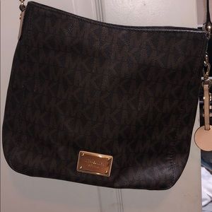 Dark brown crossbody Michael Kors purse